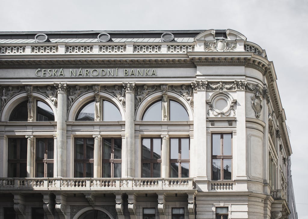 Elegant exterior of Česká Národní Banka showcasing classic architecture in Prague, Czech Republic.